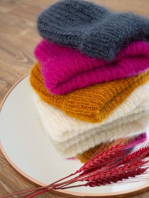 Bonnet en mohair de differentes couleurs